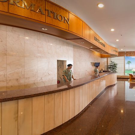 Seogwipo Kal Hotel Buitenkant foto Reception desk at a hotel